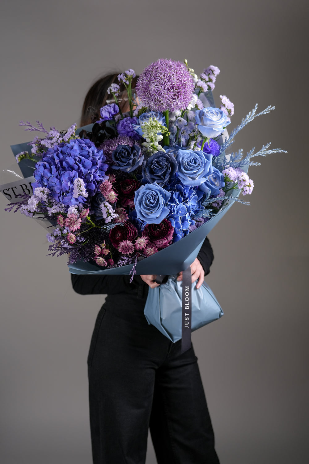 Delphinium and dahlia arrangement in deep blue and purple tones, Chicago florist