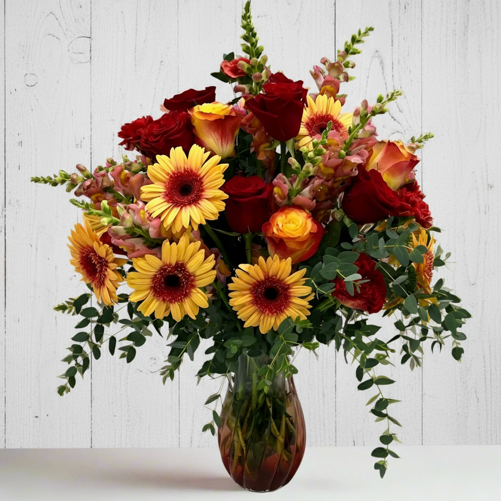 Fall gerbera and roses vase arrangement